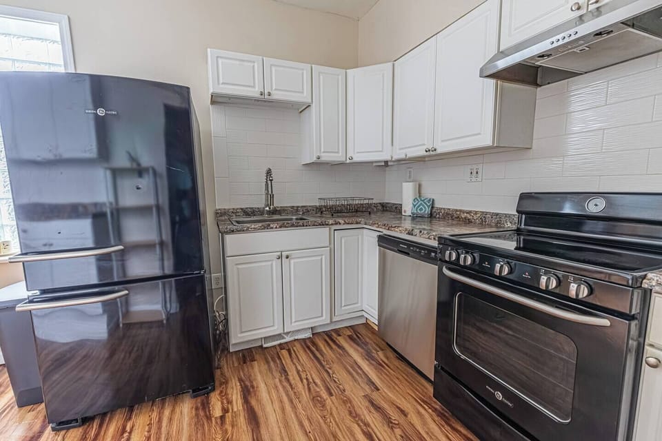 Fully equipped kitchen with everything you need to prepare meals during your stay.