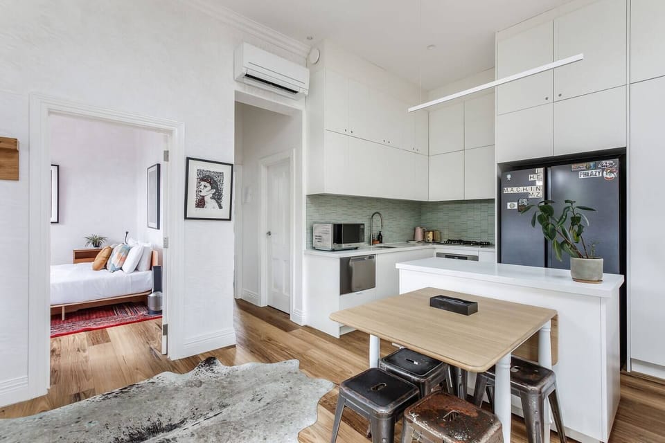 The dining area creates a cosy setting for shared meals.