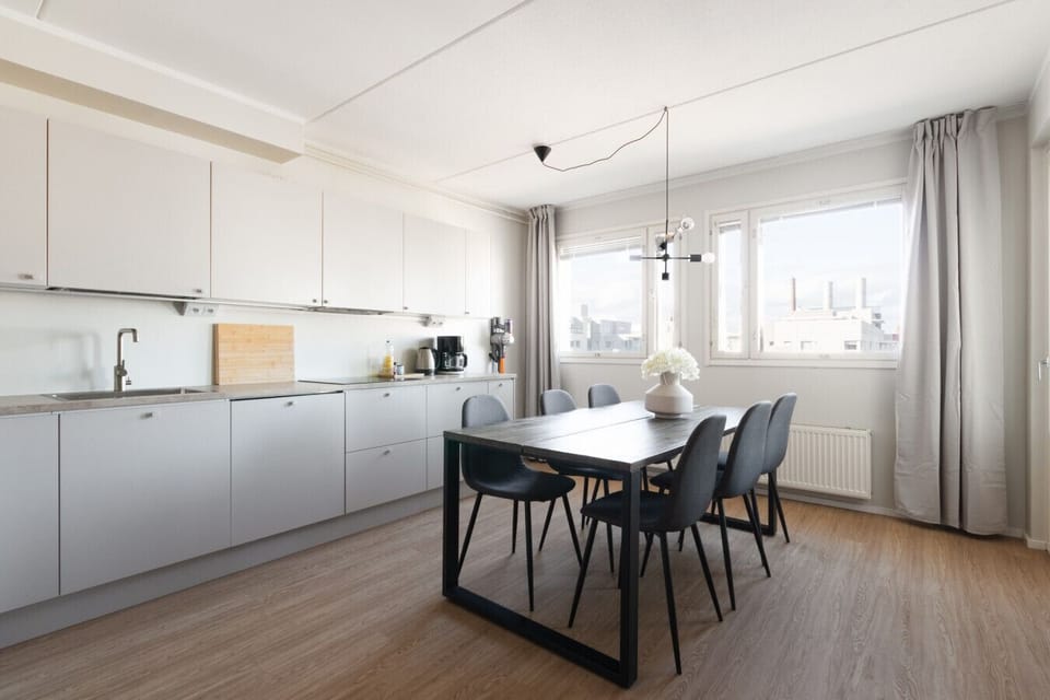 The kitchen is fully equipped and has 6 person dining table