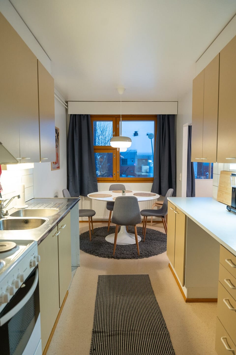 The dining area is next to the large kitchen