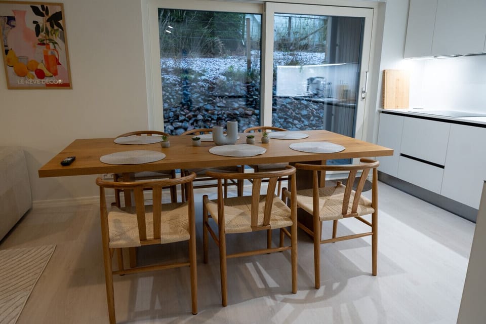 The kitchen has direct access to the backyard patio
