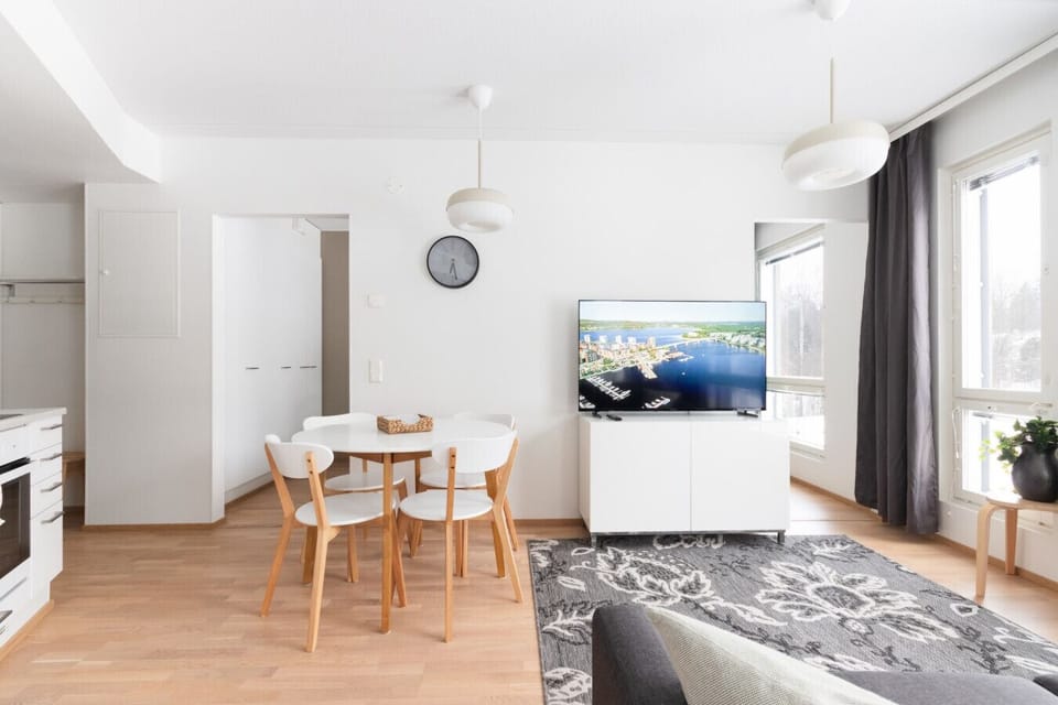 Open floor-plan combines the kitchen and living room into one space. Access to the balcony and both befrooms is from the living room