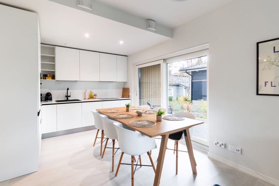 The dining table is large and sits 6 persons comfortably