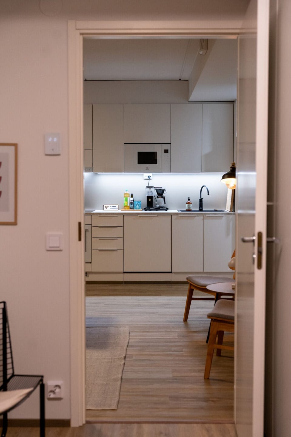 The view from the second bedroom towards the kitchen