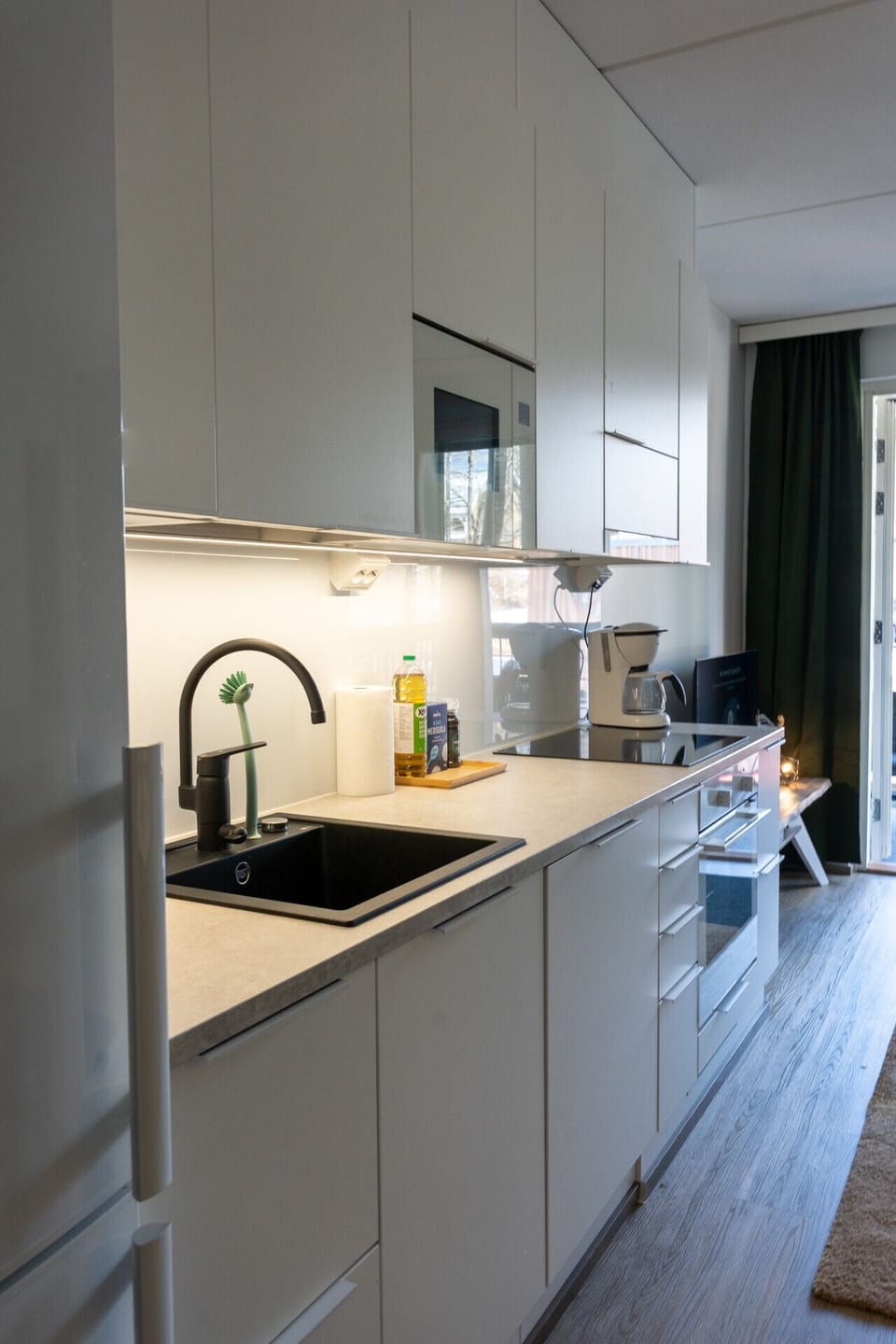 The fully-equipped kitchen with modern appliances