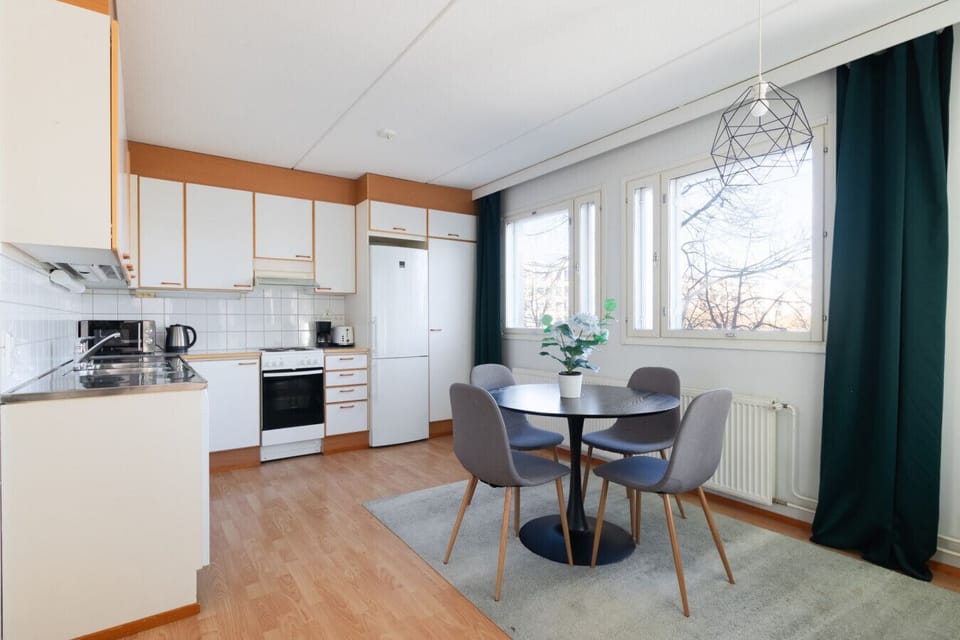 The kitchen with dining table for four