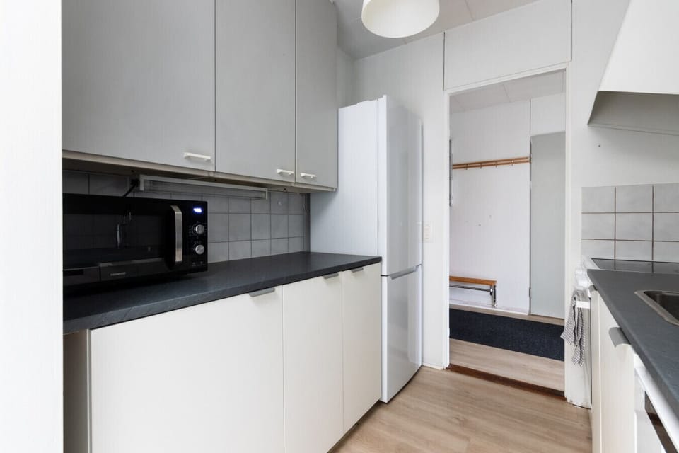 Kitchen has basic cooking equipment.