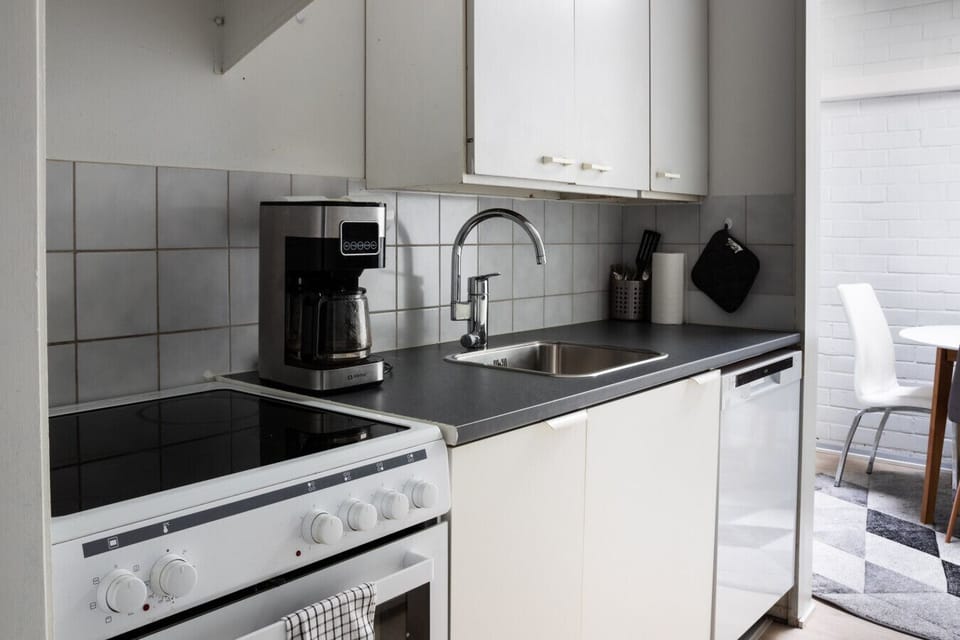 Kitchen has basic cooking equipment.