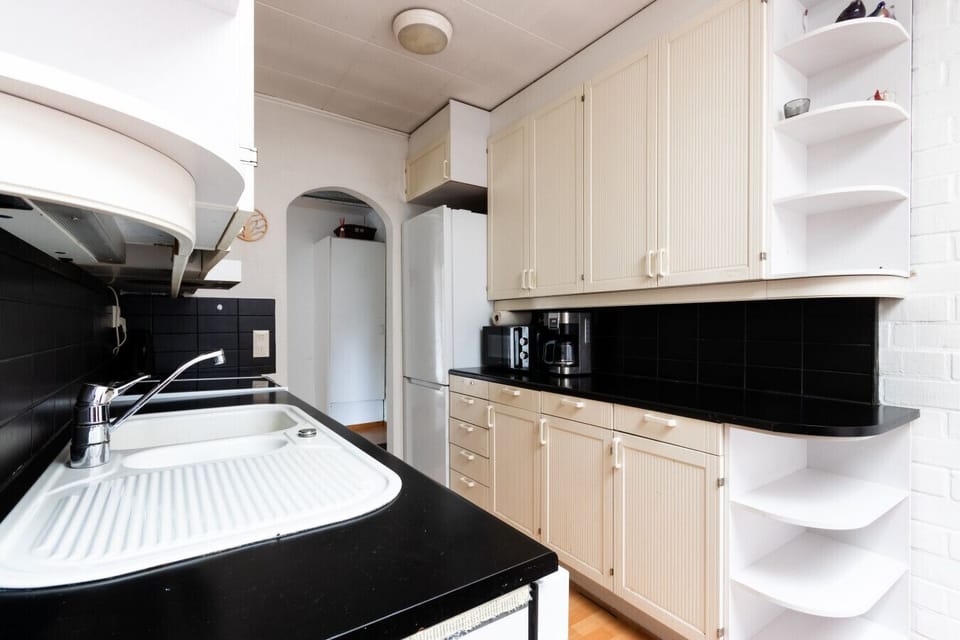 Kitchen has basic cooking equipment.