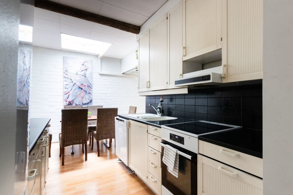 Kitchen has basic cooking equipment.