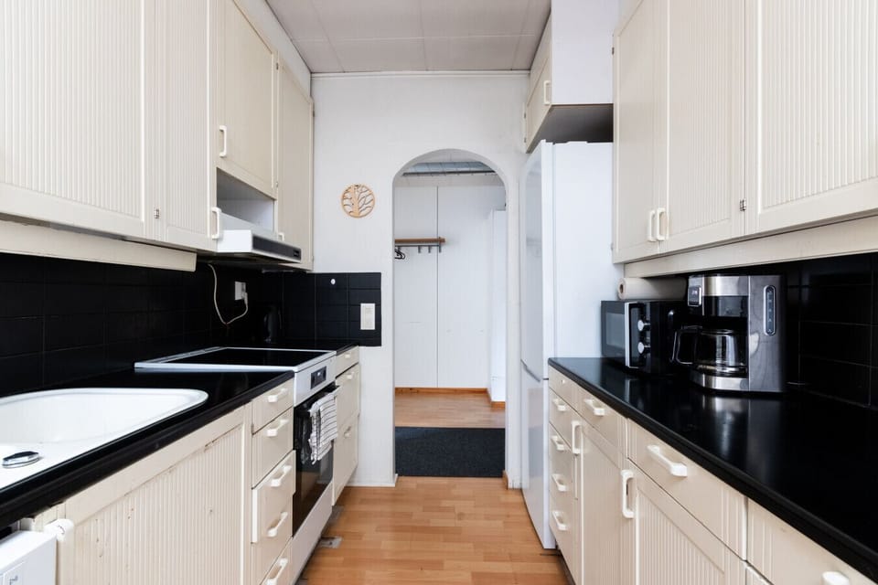 Kitchen has basic cooking equipment.