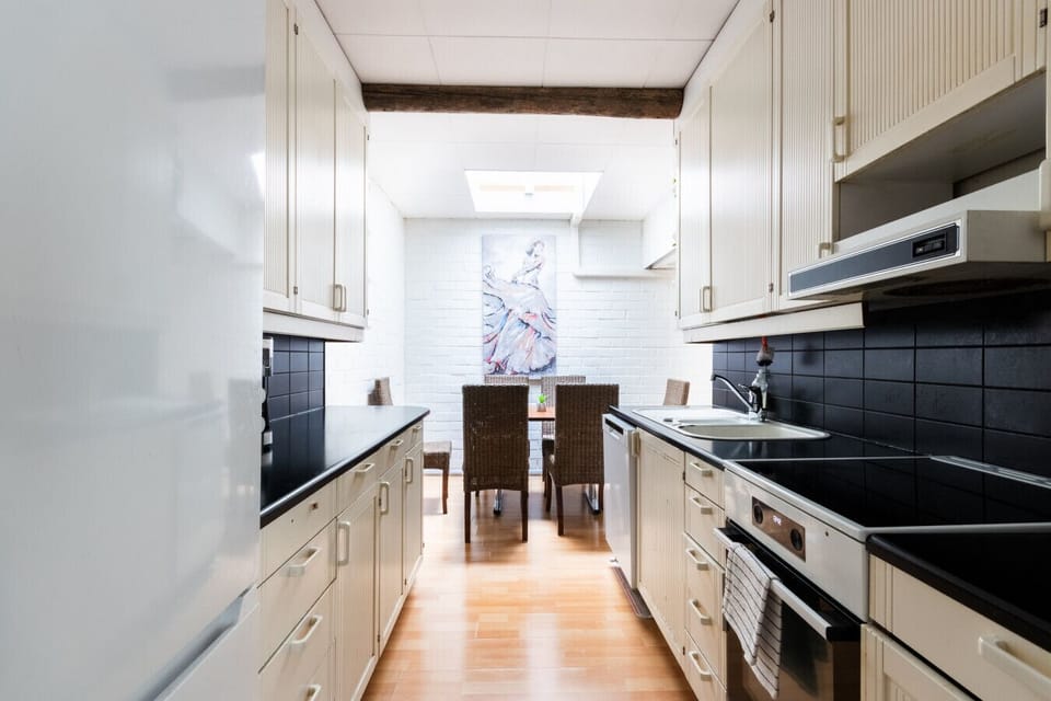 Kitchen has basic cooking equipment.