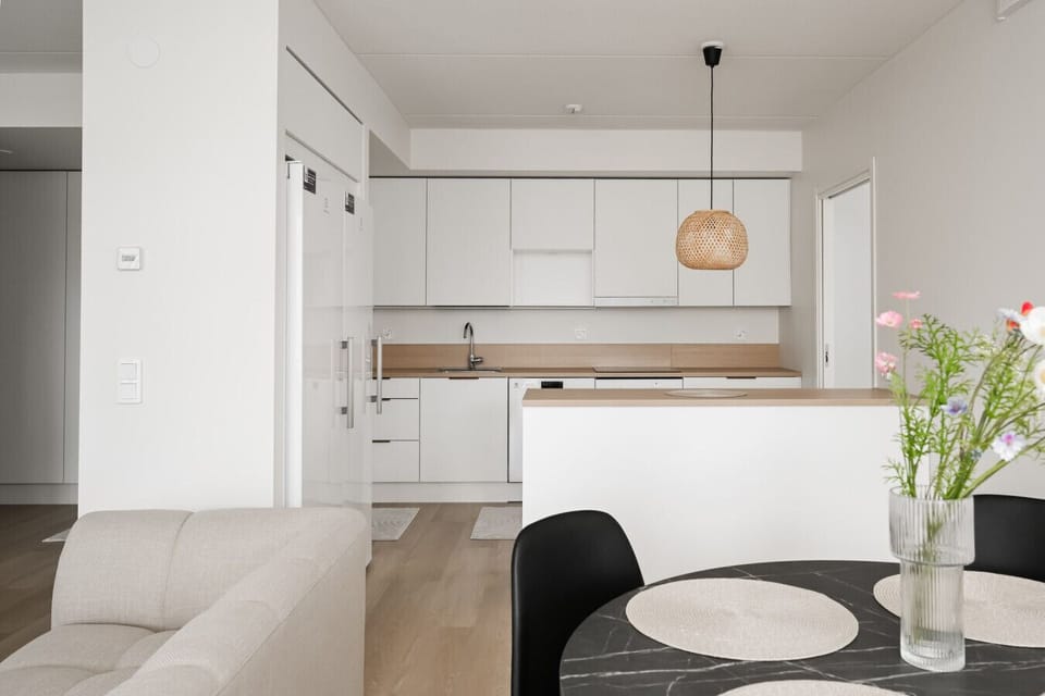 The loft-like layout combines the living room, kitchen & dining room