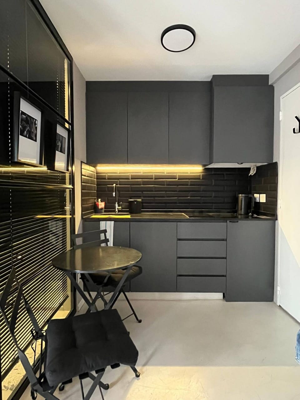 Sleek black kitchenette