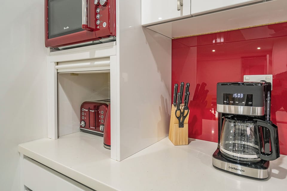 Whether brewing your morning coffee or preparing dinner, the well-equipped kitchen provides the appliances and workspace needed for effortless holiday cooking.