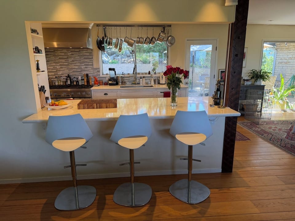 Kitchen and kitchen bar from living / TV room