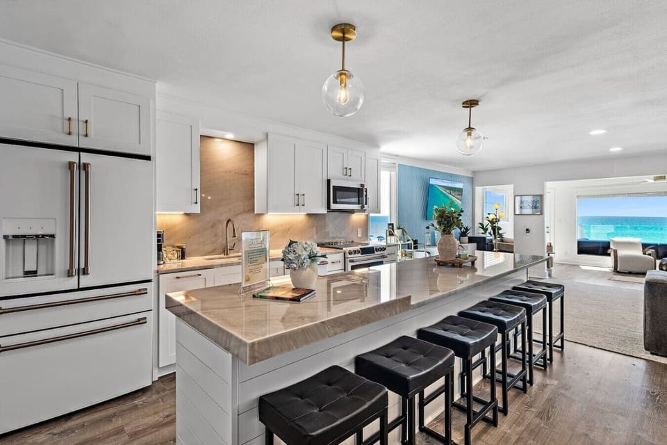 Fully-Stocked Kitchen with Luxury Appliances and Quartz Countertops