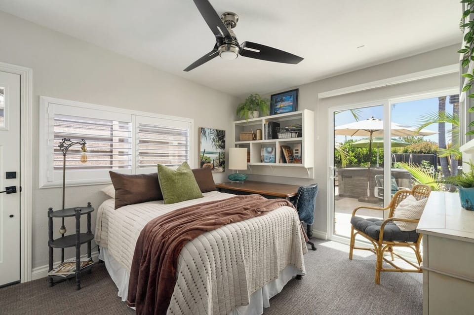 Bedroom 3 | Full | Bright full bedroom with private patio access and a peek of the backyard umbrella.