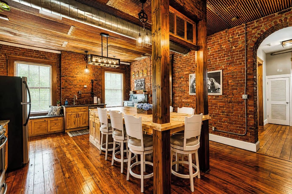 Spacious open-concept kitchen with island dining