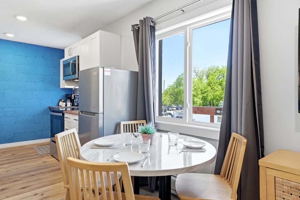Bright dining space with a convenient kitchen.