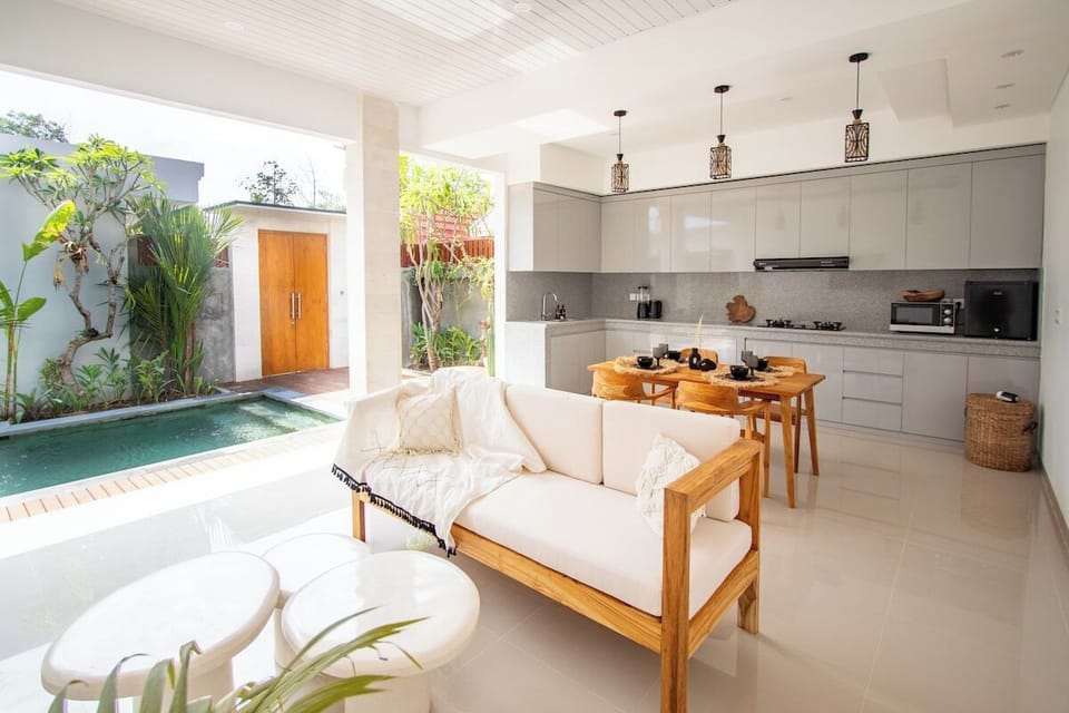 Living Room: Bright and airy with modern decor, perfect for relaxing after a day of adventures!