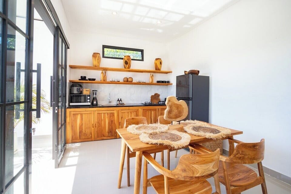 A private villa's dining area whispers romance, perfect for intimate gatherings.