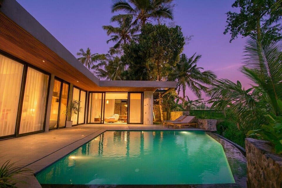 Outdoor Oasis: Dive into paradise with your private pool and stunning tropical views!