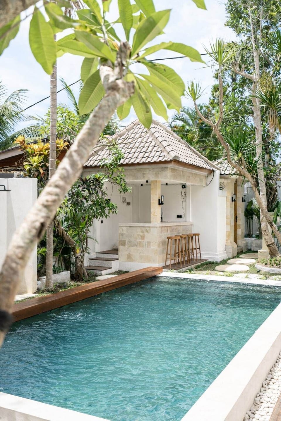Poolside Paradise: Refresh in your private pool surrounded by lush tropical gardens!