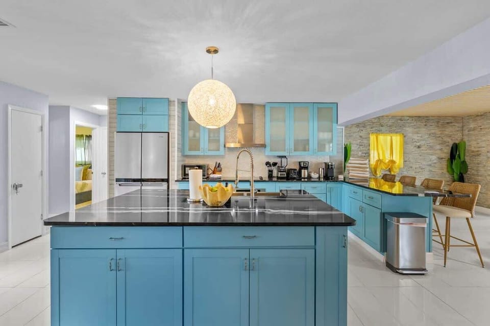 Kitchen: A bright, functional kitchen with ample counter space and everything you need for easy meal prep, morning coffee, or casual dining during your stay.