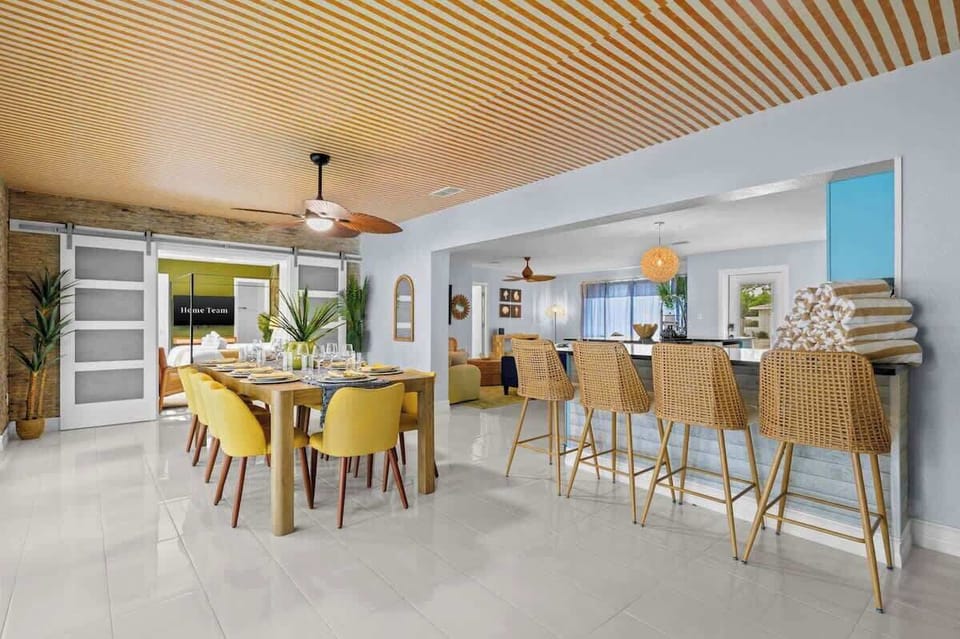 Dining Area: Gather around this inviting dining space, ideal for shared meals, casual breakfasts, game nights, or simply relaxing together during your stay.