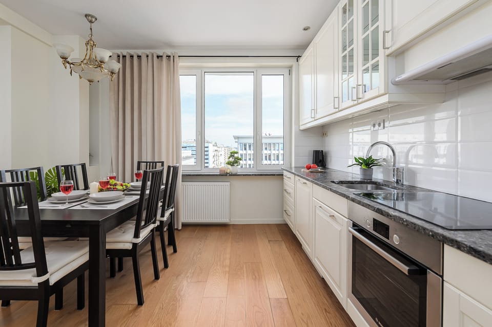 Superior Apartment, City View | Private kitchen | Highchair, griddle, eco-friendly cleaning products, freezer