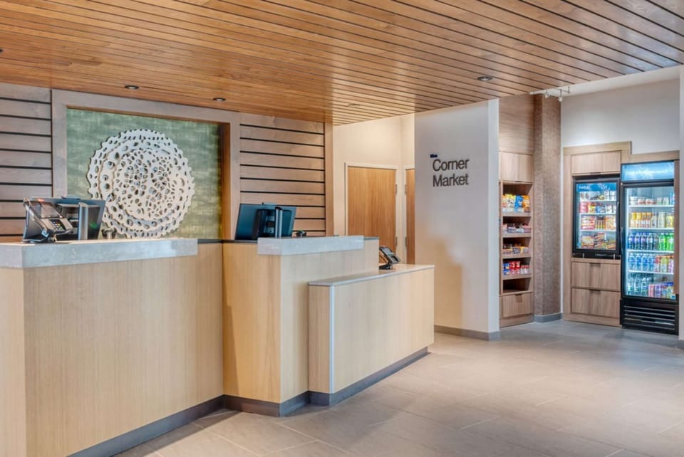 Front desk beside snack area and drink coolers