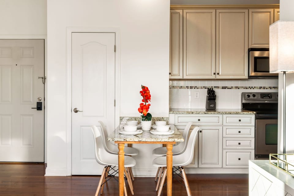 Gather around the dining table for relaxed meals or to plan your next beach day.