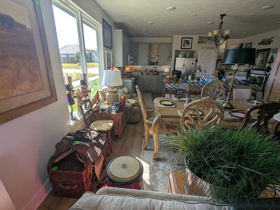From TV  toward kitchen. Natural light from the East. Sunrise.