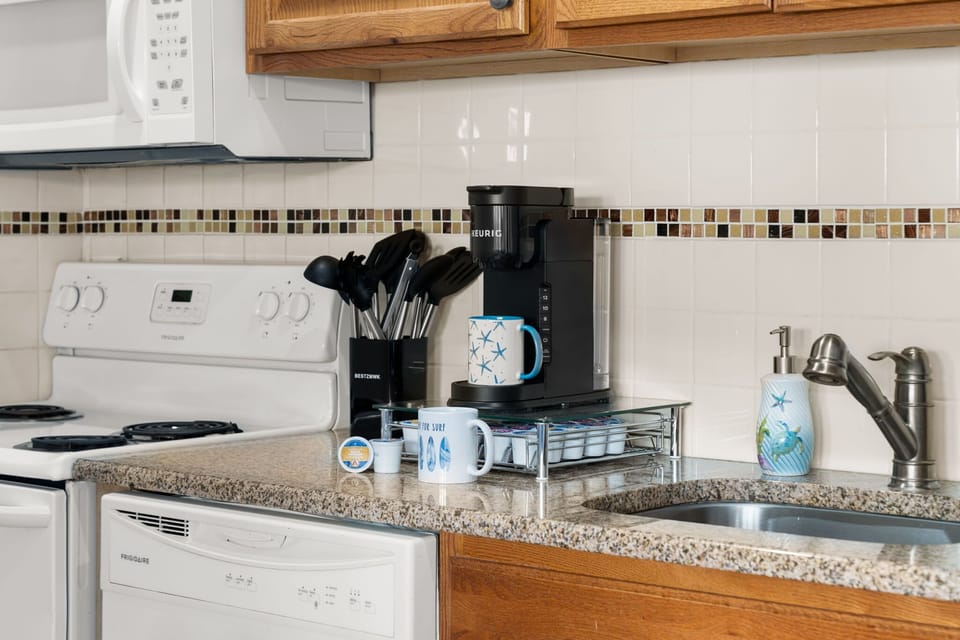 Brew your morning coffee before taking the short stroll down to the beach.
