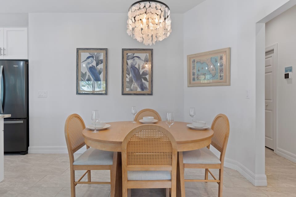 Dining room table set for four