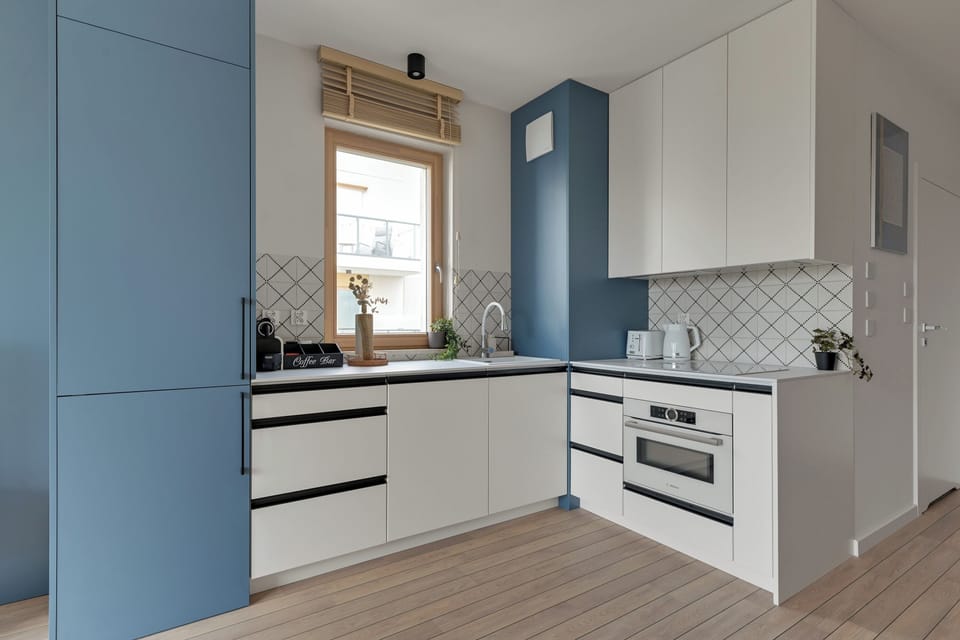 Deluxe Apartment, Balcony, Courtyard View | Private kitchenette | Coffee/tea maker, electric kettle, toaster, highchair