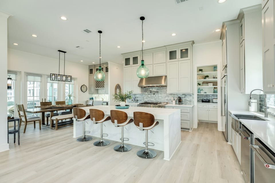 Living area flows into the open kitchen and dining space