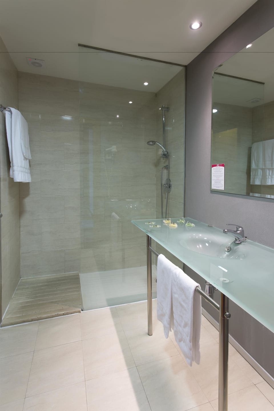 Shower, free toiletries, hair dryer, towels