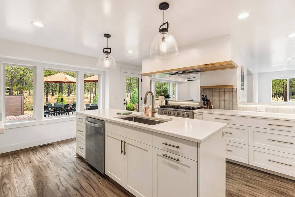 Kitchen. Dishwasher.  Incredible natural light and view out to common space and golf course.