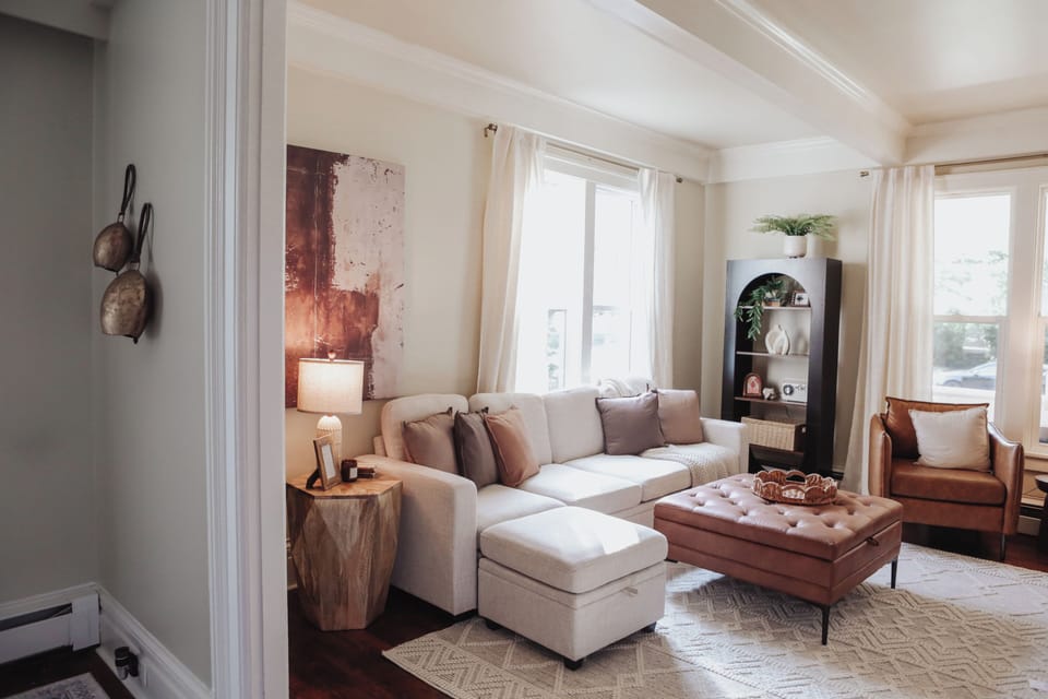 Bright, stylish living room with plush seating and beautiful natural light
