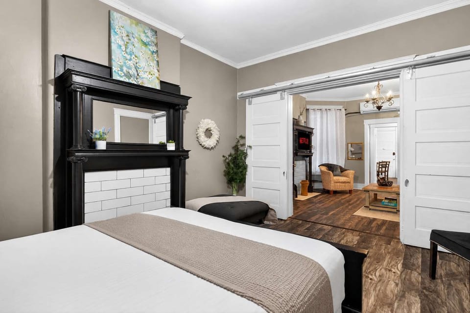 Bedroom 1: Cozy and inviting bedroom with comfortable bedding and a relaxing atmosphere, offering a peaceful space to unwind and recharge after a full day of exploring.