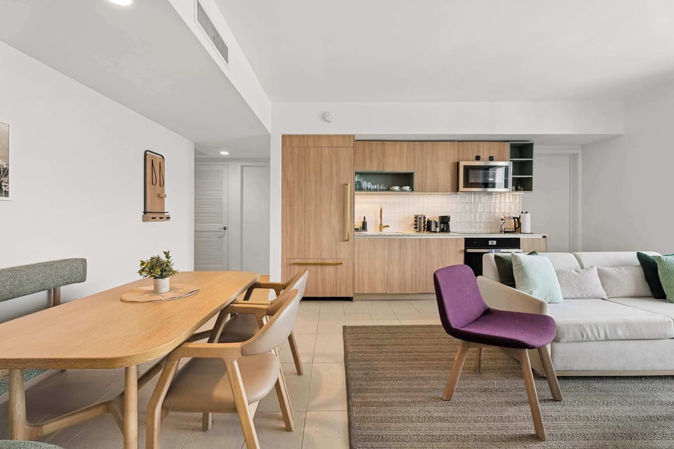Gather for meals in this spacious, open-concept dining and living area