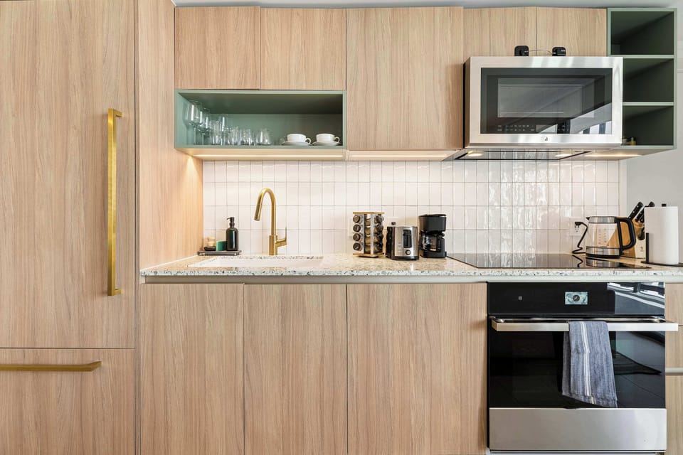 Fully equipped chef’s kitchen with modern appliances and sleek finishes.
