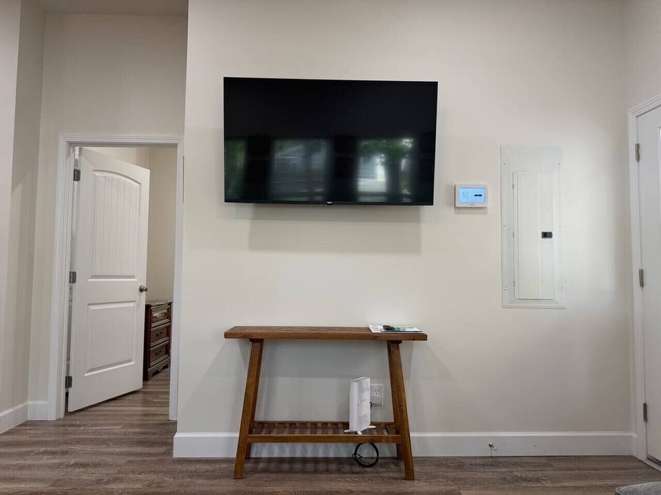 Sleek TV unit with beautiful living room