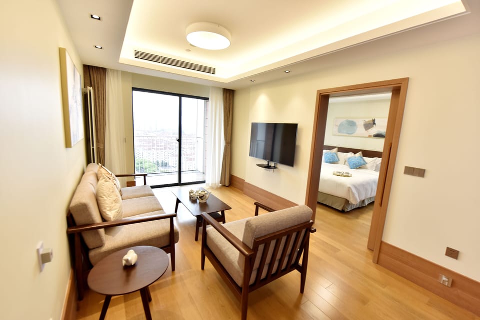 Two Bedroom Executive | Living area | TV