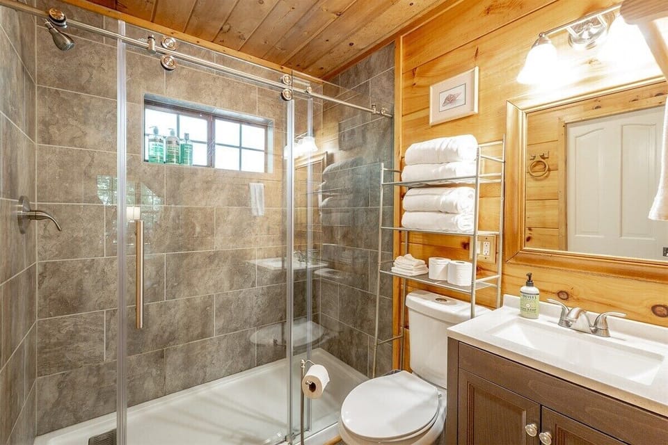 Bathroom with a glass-enclosed shower