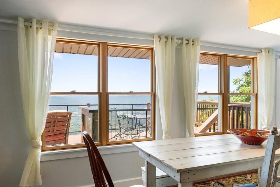 Window-side dining with a bluff outlook