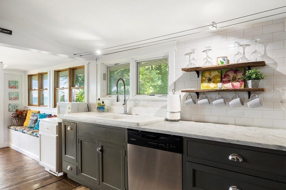 Window-side counters and open kitchen shelving