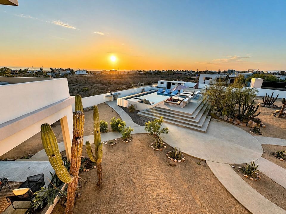 Upstairs terrace and pool at sunset